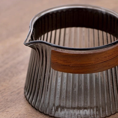 Close-up of Dongli Portable Tea Set teapot showcasing its elegant ribbed design with a wooden handle. Perfect for outdoor and travel tea brewing.