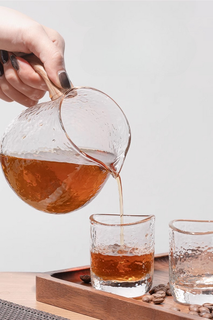 Pouring coffee into hammered texture glass from Timemore coffee set